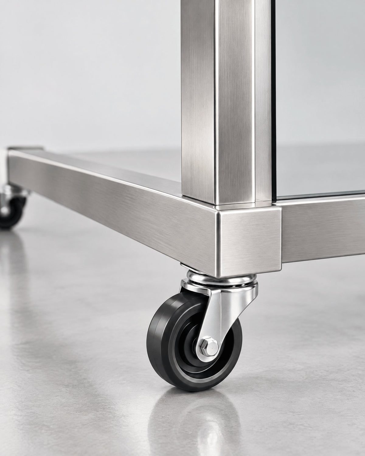 Close-up of a caster on the external brushed steel JBS Float base